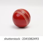 Small photo of A Shiny New Test Match Cricket Ball Leather Hard Circle Stitch Closeup Picture On White Background