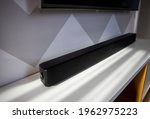 soundbar in a modern home. Listening to music watching movies in dolby surround