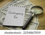 Small photo of Contingency Fee wording with magnifying glass and money. Business concept