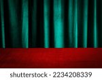 Small photo of Modern background with empty red cloth table and green draped velvet curtains. Template for advertising, presentation, cosmetic products. Mockup, texture.