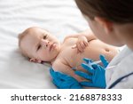 Small photo of Doctor vaccinating baby in clinic. Little baby get injection. Pediatrician vaccinating newborn baby. Vaccine for infant child. Child's Immunization, Children Vaccination, Health concept. Dengue fever
