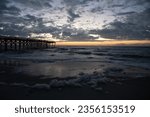  Sunrise over the Pawley's Island fishing Pier one week after Hurricane Ian washed half of the pier out to the Atlantic Ocean