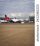 Small photo of Austin Bergstrom International Airport, Texas, USA, February 23, 2023 - Jet Blue's Airbus 320 N605JB painted in Boston Red Sox Livery at the airport gate