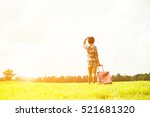 woman traveler with backpack and hat walking in amazing meadows and forest, wanderlust travel concept