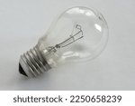Incandescent light bulb on white background
