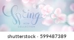 pink sakura falling petals... | Shutterstock .eps vector #599487389