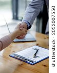 Small photo of Contract and business employment resume job interview Recruitment. HR review the profile resume of the job applicant. Business employment and human resource management concept.