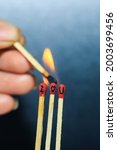 Small photo of I Love You on Match Sticks. Matchstick art photography used matchsticks to create a love concept. Close-up of burnt matchsticks.