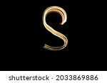 Letter S. Light painting alphabet. Long exposure photography. Drawn letter S with gold lights against black background.