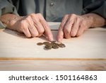 hands of an elderly man holding ... | Shutterstock . vector #1501164863