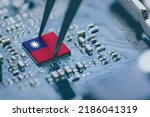 Flag of the Republic of China or Taiwan on a processor, CPU Central processing Unit or GPU microchip on a motherboard. Taiwan manufacturing chip industry emerges as battlefront in US - China showdown.