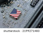 Flag of USA on a processor, CPU Central processing Unit or GPU microchip on a motherboard. US firms have become the latest collateral damage in US-China tech war. US blocks sales of AI chips to China.