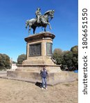 Small photo of Florance, Italy - October 03, 2018 ;one man standing in front the statu