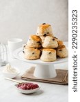 Small photo of Scone Stacked on top of each other, on white dessert trays, with Space For your Text or Graphics Design.