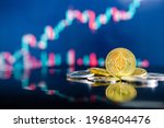 Ethereum (ETH) and other crypto coins with blurred candlestick chart. Ethereum is a decentralized, open-source blockchain with smart contract. Cryptocurrency and decentralized finance concept