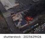 Small photo of Durban, South Africa - 07 12 2021: Shopping centre on fire due to looting