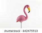 A Pink Plastic Flamingo On A...