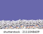 Small photo of 100 dollar bills wiggle on purple or violet background. Banner about money with copy space.