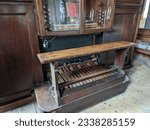Small photo of Bamburgh, Northumberland, England, UK. May 6, 2023. The ancient and historic organ inside the Parish Church of St. Aidan's.
