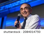 Small photo of Nimes, France - 15 october 2021:The extreme right-wing polemicist Eric Zemmour, candidate for the French presidential election in 2022 makes a speech on stage during a conference.