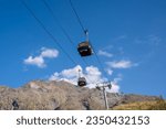 Small photo of Les Arcs 2000, France - 19-08-2023: A cable car from the Arcs 2000 ski resort is at a standstill in summer.