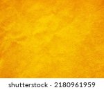 Yellow old velvet fabric texture used as background. Empty golden fabric background of soft and smooth textile material. There is space for text.	