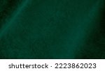 Small photo of Green velvet fabric texture used as background. Empty green fabric background of soft and smooth textile material. There is space for text.