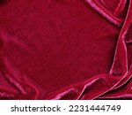 Small photo of Red velvet fabric texture used as background. Empty red fabric background of soft and smooth textile material. There is space for text.