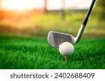 Small photo of Golf ball close up on tee grass on blurred beautiful landscape of golf background. Concept international sport that rely on precision skills for health relaxation.