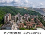 Small photo of Beautiful Rooftop aerial view of the Majdanpek city residential area and architecture. The city is famous for one of largest mine copper in world. Majdanpek, Bor, Serbia 06.06.2022