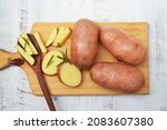 Red potatoes on a rustic  background. Also known as 