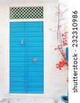 turkey blue door with white wall | Shutterstock . vector #232310986