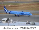 Small photo of Providence, Rhode Island, USA - May 7, 2022: Breeze Airways E-195 regional jet was widely used on domestic routes to U.S regional airports. Breeze Airways is a 2021 brand new airline.