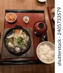 Small photo of New York, USA - 23rd December, 2023: Ootoya has the best Washu Beef Sukiyaki and Salmon Tonyu Nabe Pot in New York City.