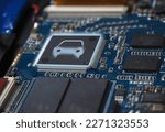 Small photo of Chips in automotive manufacturing. Electronic circuit boards with chips. Smart car micro chip concept background.