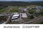 Small photo of Aerial view of the Ray Spring training field The Twisted Fork restaurant, Bert's Black Widow Harley-Davidson. Charlotte Sports Park. 2224 El Jobean Rd, Port Charlotte, FL 33948 USA, March 5, 2022.