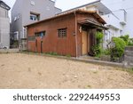 Empty house and vacant lot in residential area