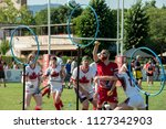 Small photo of Florence, Italy - 2018, June 30: Quidditch players during a match at IQA World Cup 2018. Quidditch is a fictional sport devised by author J. K. Rowling for her fantasy fiction series Harry Potter.