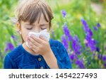 Small photo of Seasonal allergy in a child. Coryza. Selective focus.