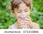 Child Drinks Water.