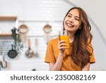 Small photo of Portrait of beauty body slim healthy asian woman drinking glass of juice and orange.young girl preparing cooking healthy drink with fresh orange juice in kitchen at home.Diet concept.healthy drink