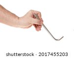 Hand holds a hex key on a white background, a template for designers.