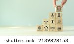 Small photo of Core values,corporate values concept. Company culture and strategy related to business and customer relationship, growth. Principles guide company's action. Stack wooden cubes with core values icons.