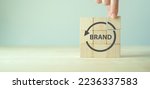 Small photo of Rebranding strategy concept. Marketing and brand management. Rethinks marketing strategy with a new name, logo, or design, the intention of developing a new. Refreshing the look and feel of brand.