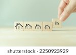Small photo of Downsizing home, houses concept. Downsizing property due to retirement or budget. Finding a tiny house or apartment. Moving to a smaller property for retirement time. Increasing cash flow.