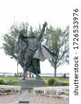 Small photo of St.George, Bermuda - August 14,2014:Sir George Somers bronze statue on Ordnance Island, St. George Town.Front view of the statue.The statue is 1.5 times lifesize and by sculptor Desmond Fountain.