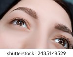 Small photo of Photo after permanent eyelash makeup open eyes with permanent eyelash makeup. Permanent eye makeup and PMU eyelashes