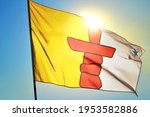 Nunavut province of Canada flag waving on the wind