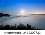 Small photo of The sea of clouds on a quiet moonlit night makes you feel unpredictable. Peaks surrounding Emerald Reservoir. Xindian District, New Taipei City, Taiwan.