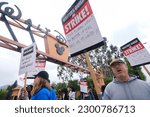 Small photo of Striking members of the The Writers Guild of America (WGA) picket outside the Walt Disney Company on Tuesday, May 9, 2023, in Burbank, California.